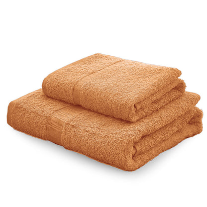 Set asciugamani in spugna Gabel Tinta Unita bruciato presentato su sfondo bianco